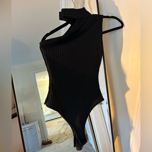 NWT asymmetrical pretty little thing body suit - size US 2